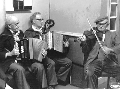 Fred Whiting, playing in Eye Red Lion, with Font Watling and  Eddie Warner.  Photo by John Howson